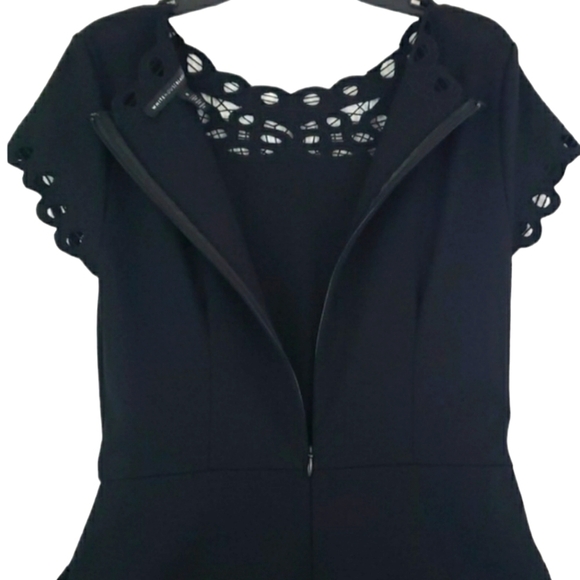 White Hause Black Market~Woman Size 0~Black Fit/Flare Lazer Cut Dress Pockets. - Picture 8 of 11